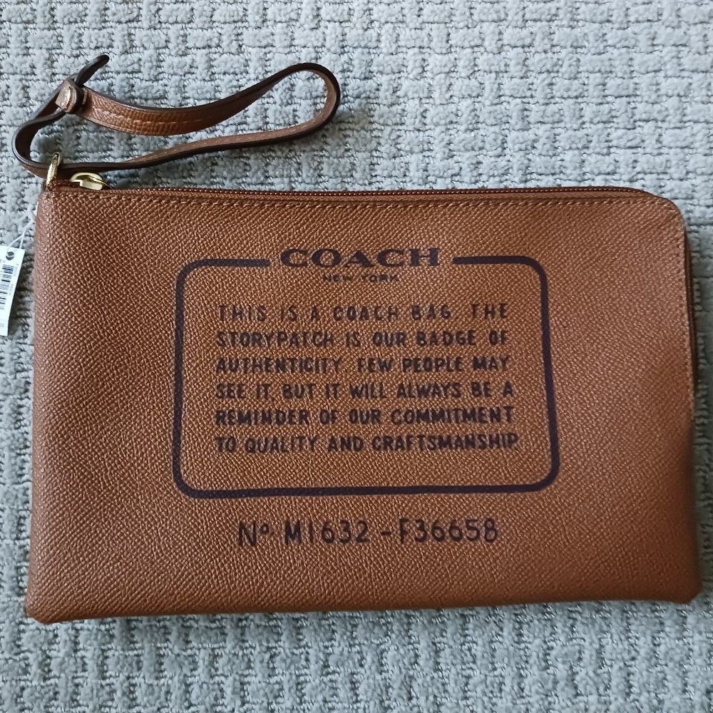 Coach NWT.Storypatch Pouch NWT